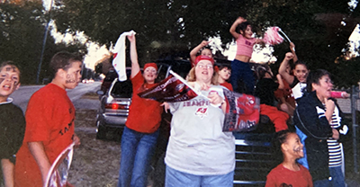 Carmen Pizarro cheering on the Bucs with her family.
