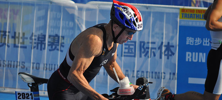 Morris rides his bike at the World Triathlon in Beijing.