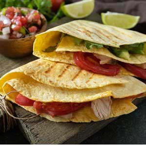 healthy tortilla with chicken, lettuce, salsa and cheese