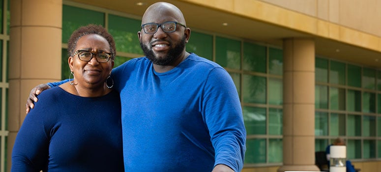 Michael Signil poses with his mother, Belinda.