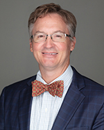 headshot of Dr. Eric Haura