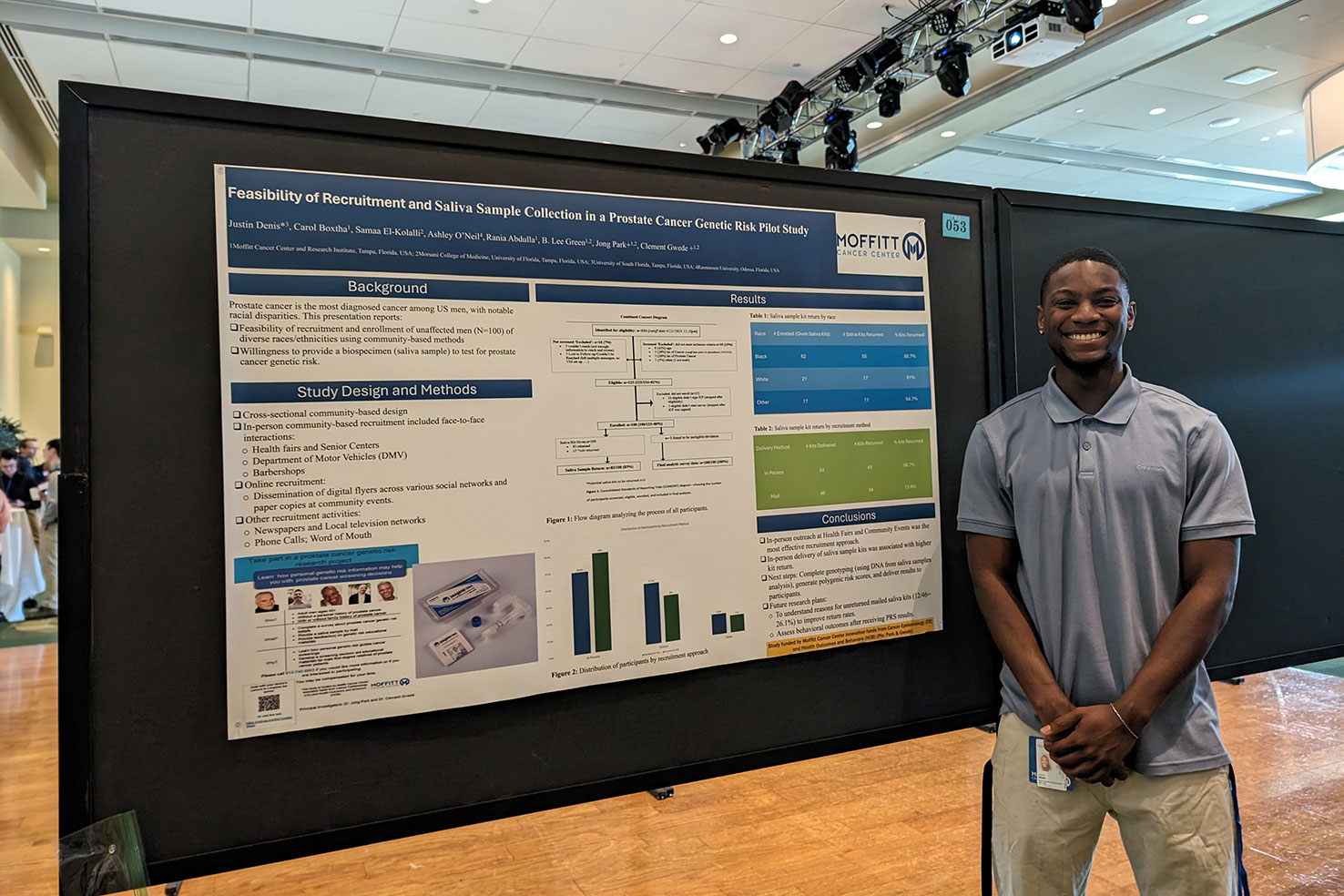 DICR intern Dennis with his poster
