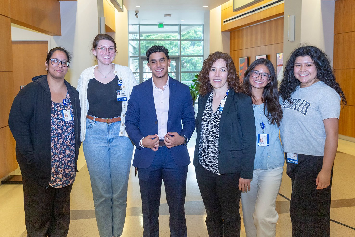 Dr. Karen Mann poses with a group of interns