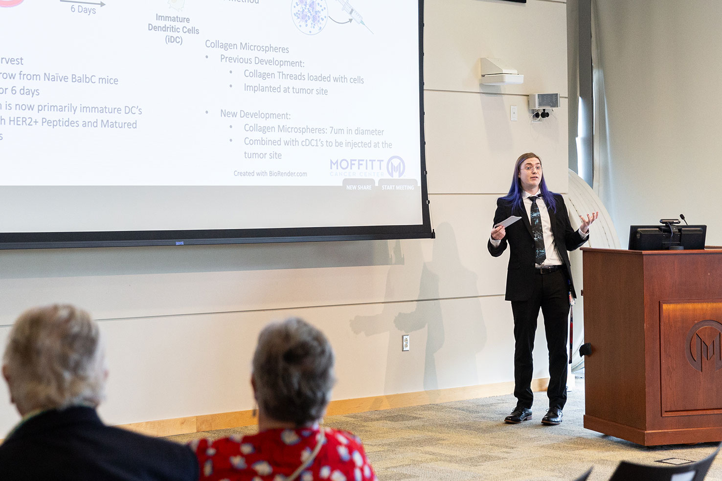 An intern gives a presentation