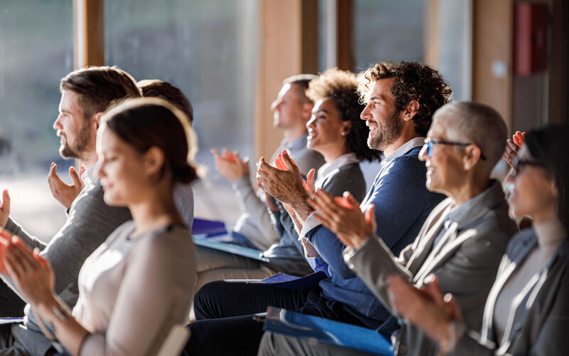 people clapping at a event