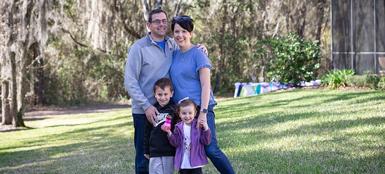Gene, Landon, Jamie and Madison Losito enjoy playing in the backyard.