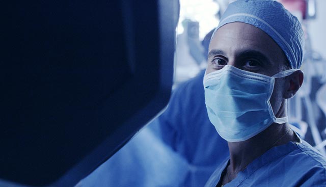 lung cancer surgeon looking into camera