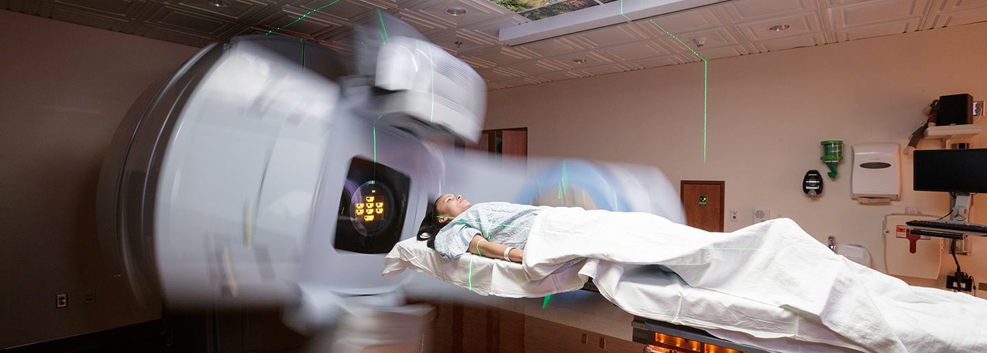 A patient receiving radiation therapy at Moffitt.
