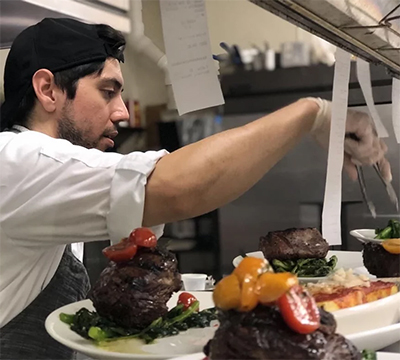 Chef Torres in the Kitchen a CENA in Tampa, Florida.