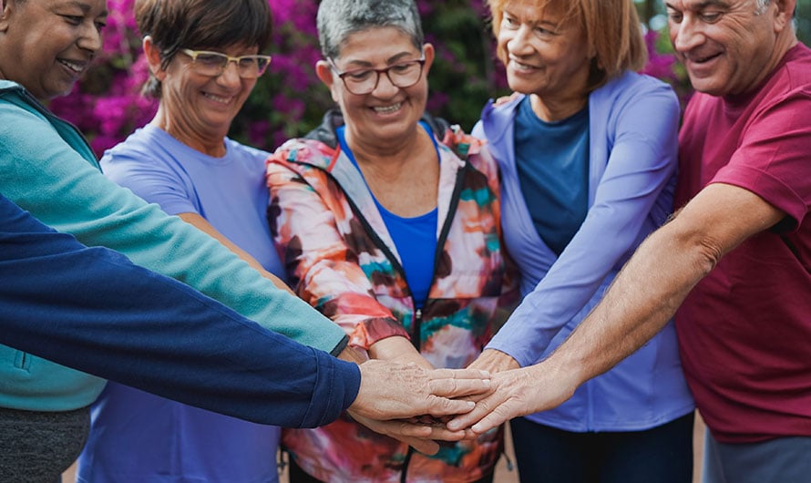 group of women with hands together