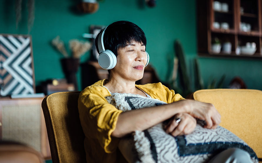 woman meditating in chair