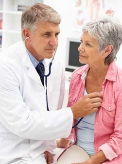 doctor checking patient's lung