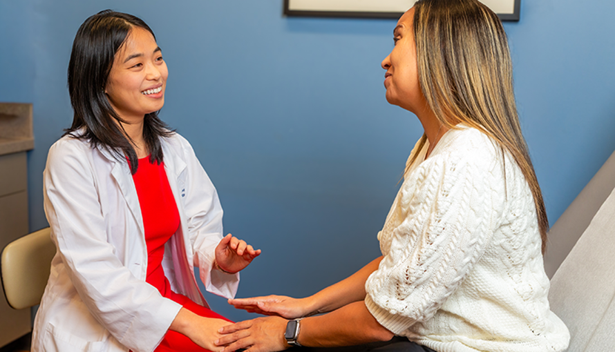 A doctor comforts patient in hospital