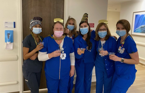 Rau with her nurse colleagues at Moffitt.