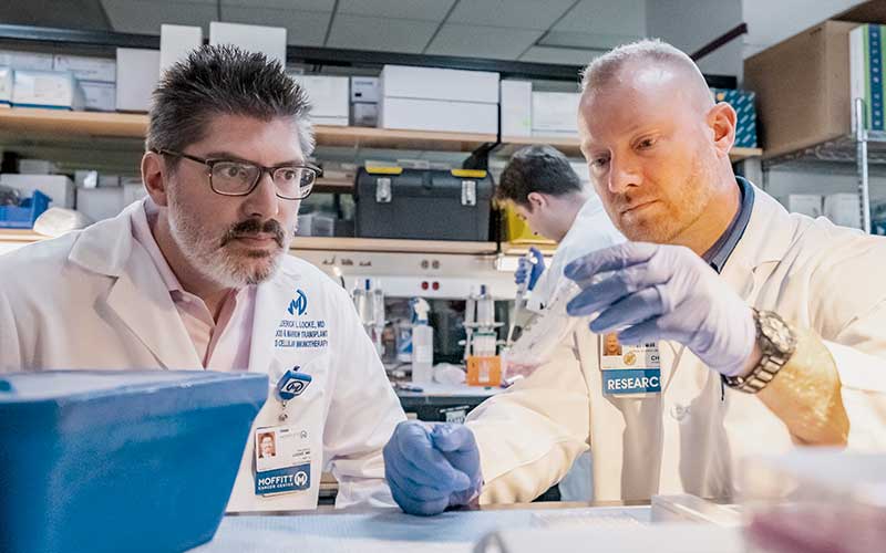Dr. Locke in a Research lab.