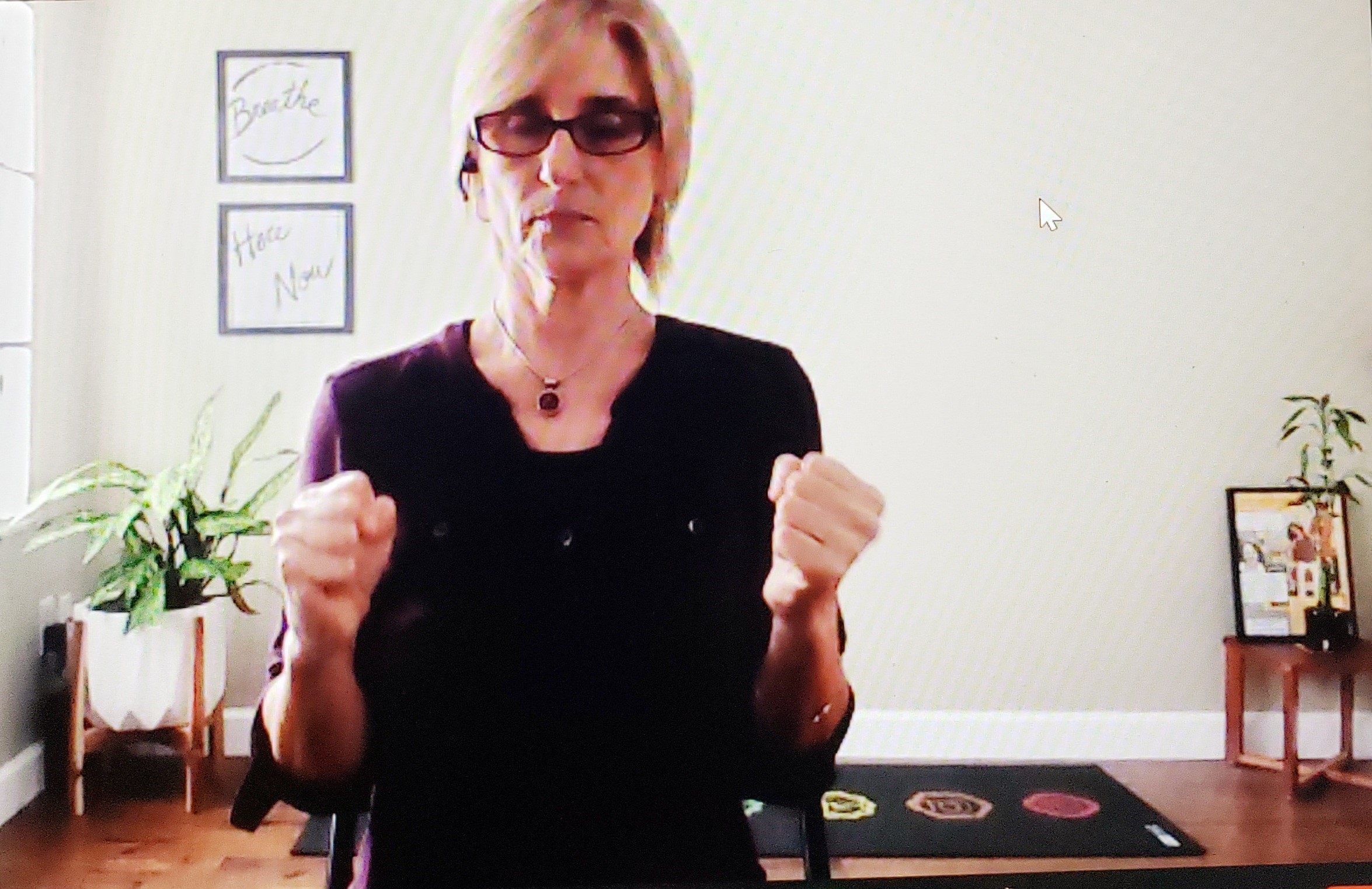 Sharen Lock MS, C-IAYT Patient Wellness Coordinator and Yoga Therapist leads a live virtual yoga session with HEART attendees