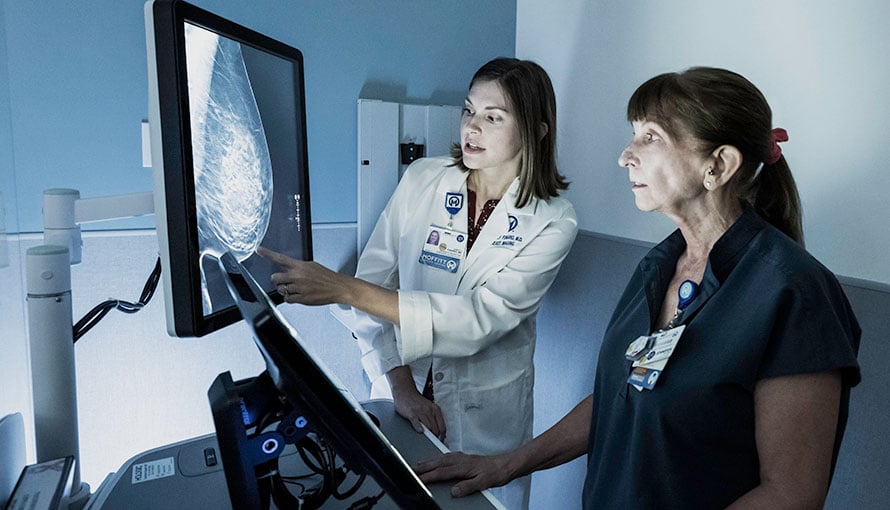 breast radiologist looking at scan