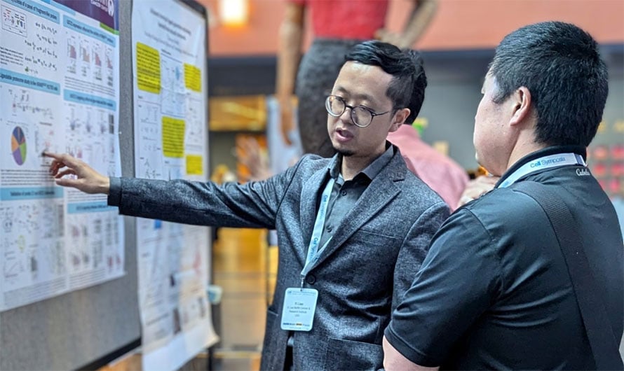 Dr. Yi Liao and his poster
