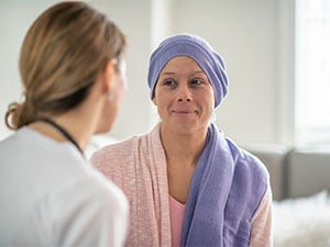 Uterine cancer patient talking to doctor