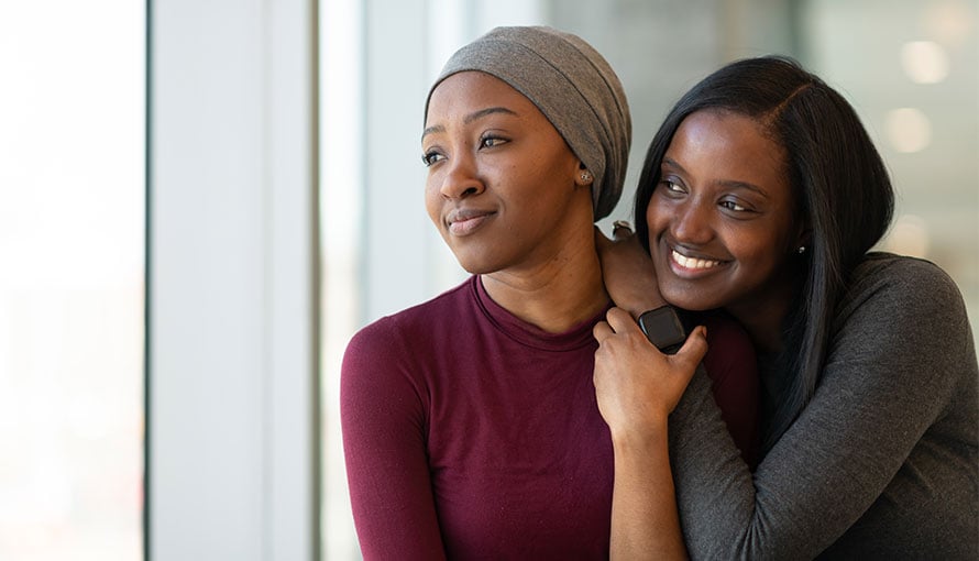 Young cancer survivor with her mother