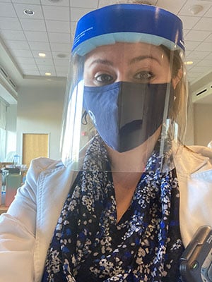 Magen Davis wearing PPE