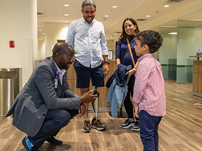 Gutiérrez and his family reunited with Odion Binitie, MD, in 2023 at Moffitt.