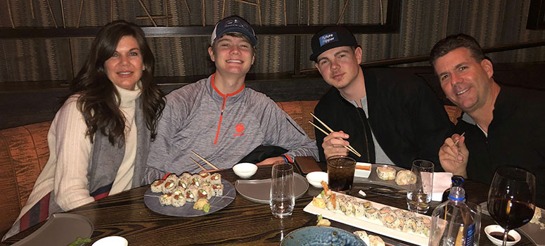 Every moment counts for the Barklage family. From left, mom Stacey, brother Dawson, Alec and dad Jeff enjoy sharing sushi.