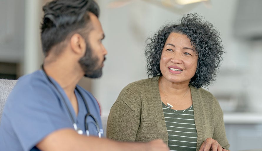 Patient discussing thymoma treatment with nurse