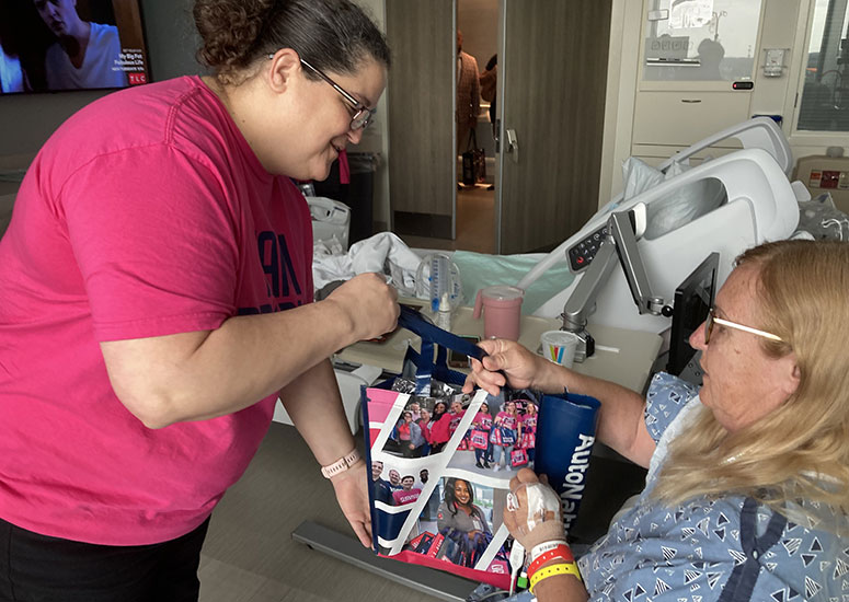 Donna Wilkinson was among the patients at Moffitt McKinley Hospital who were surprised with a Totes for Hope cancer comfort bag.