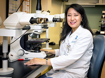 After 17 years of training, Bui was hired at Moffitt, where she would eventually become a leader in pathology. 