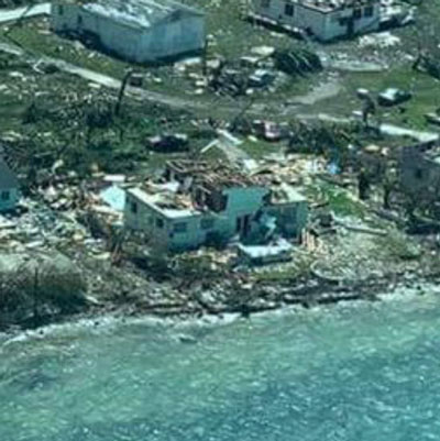 McIntosh’s damaged seaside home, as seen from the air.