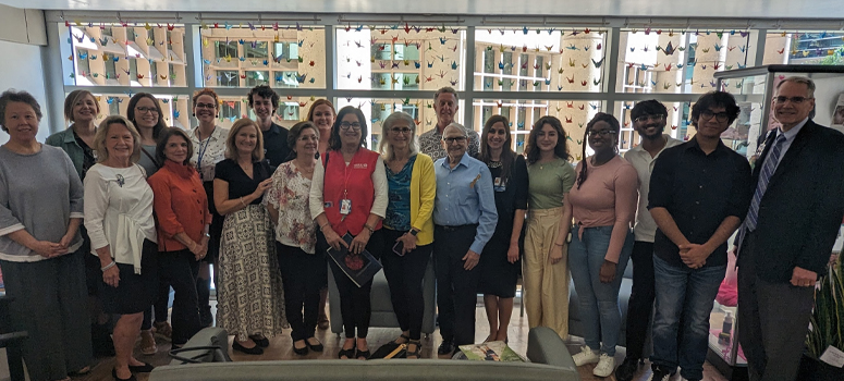 Patients, family members and team members gather to celebrate 25 years of the Arts in Medicine Program at Moffitt.