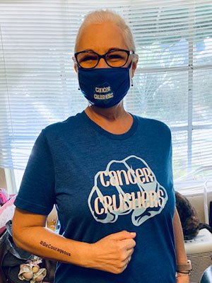 Lisa Assetta in her Cancer Crusher team gear