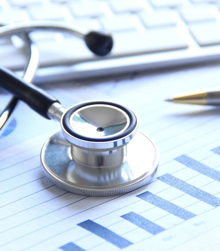 stethescope on medical papers