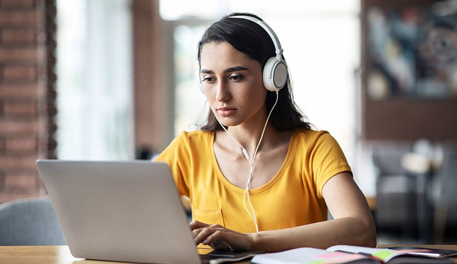 AYA patient looking at computer