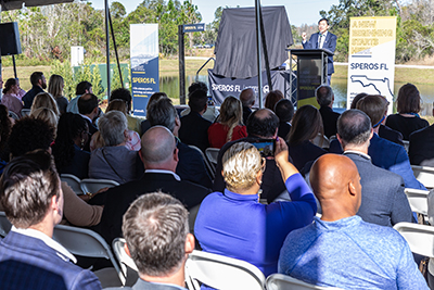 Dr. Patrick Hwu welcomes guests to the Speros FL groundbreaking in Pasco County Jan. 20.