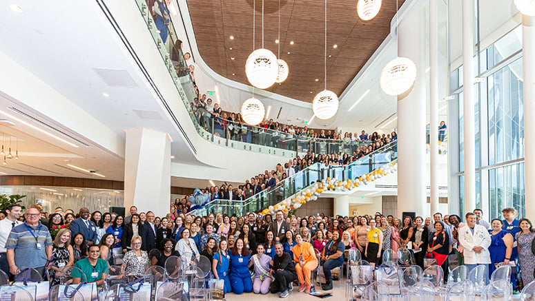 Group photo of Moffitt team members at the grand opening celebration.