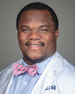 headshot of Dr. Brandon Blue