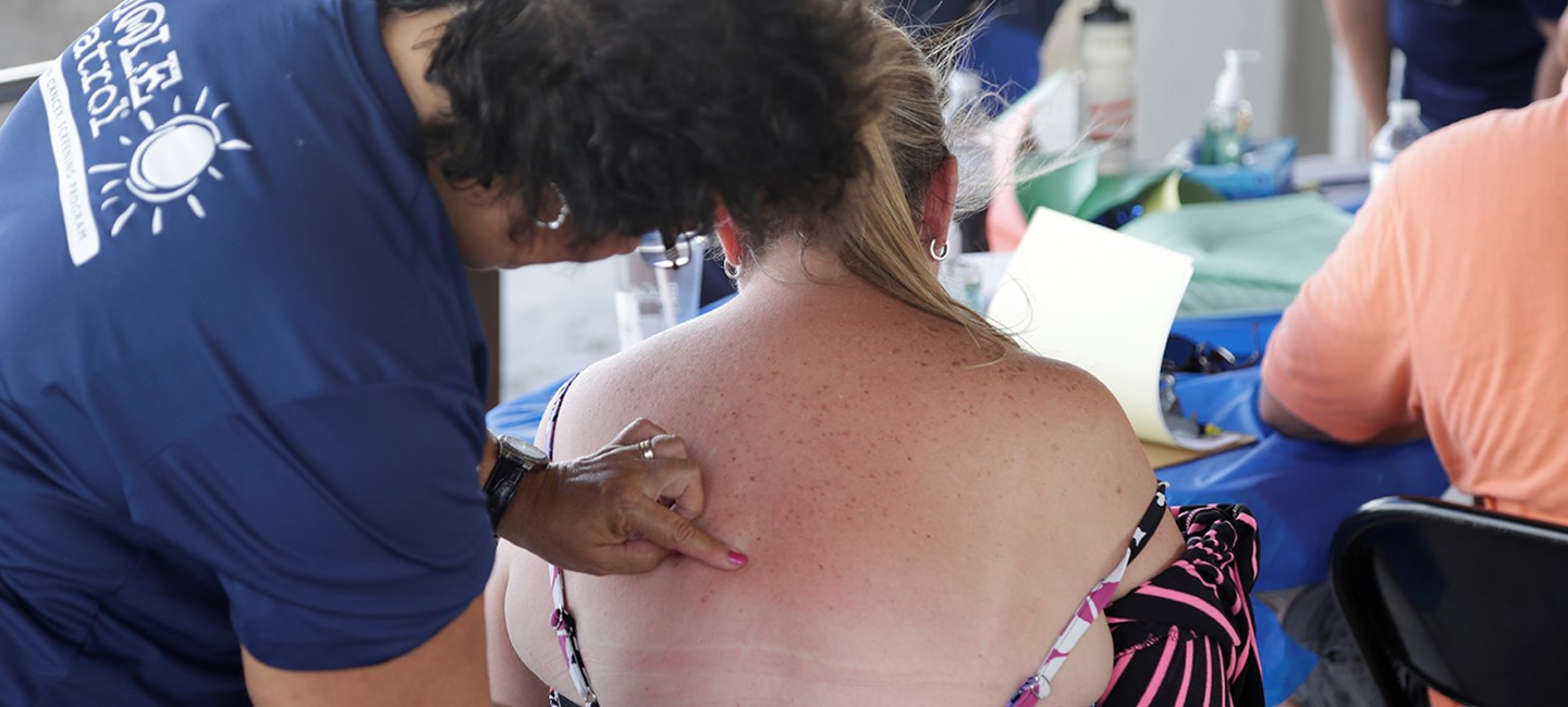 person receiving a skin cancer check