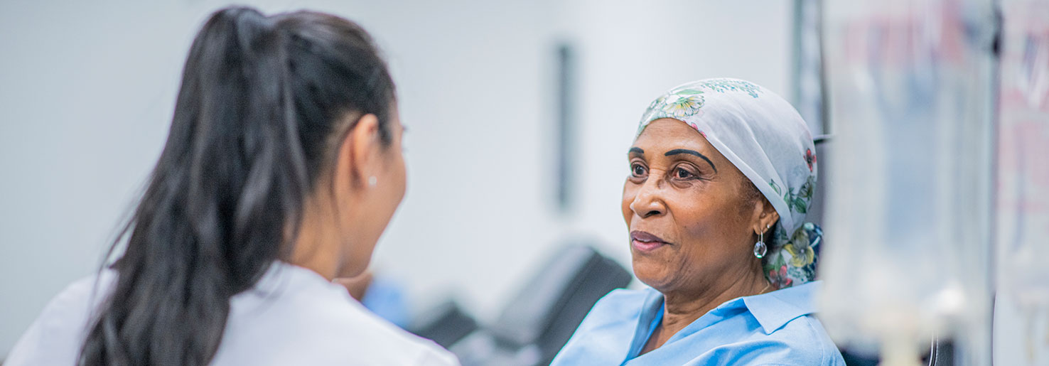 Nurse asks patients about vulvar cancer symptoms