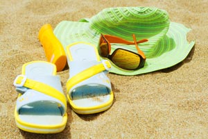 Sun prevention items: hat, sunscreen, sun glasses