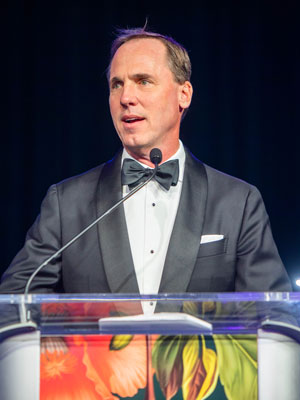 Dr. Greg Sawyer thanks the Magnolia Ball crowd for their support