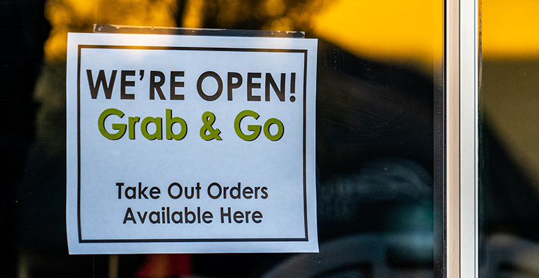 restaurant sign "grab & go only"