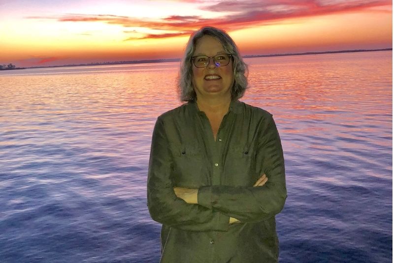 Photo of Lynn at sunset.