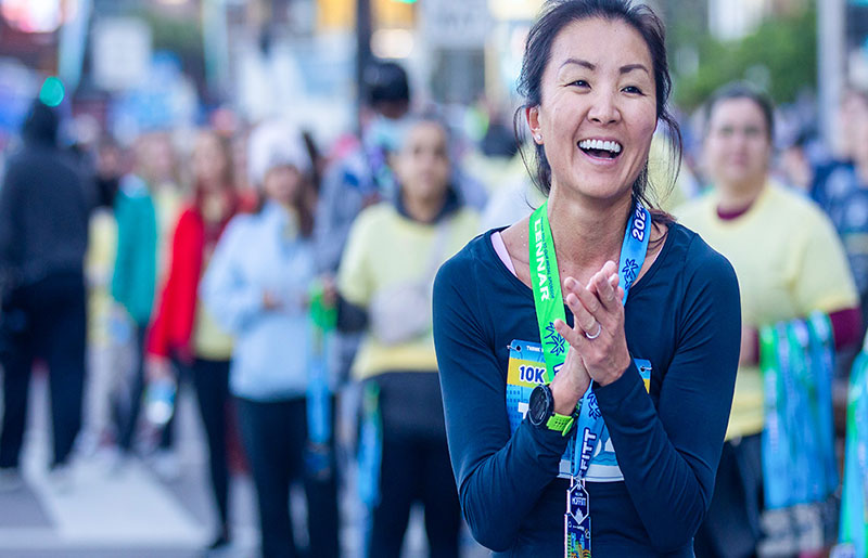 Miles for Moffitt runner cheering