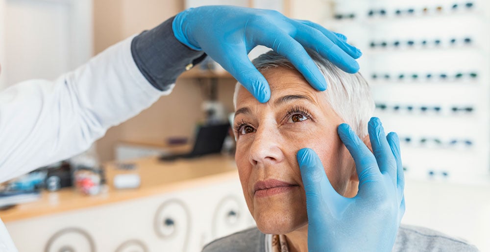 patient getting eye exam to check for cancer