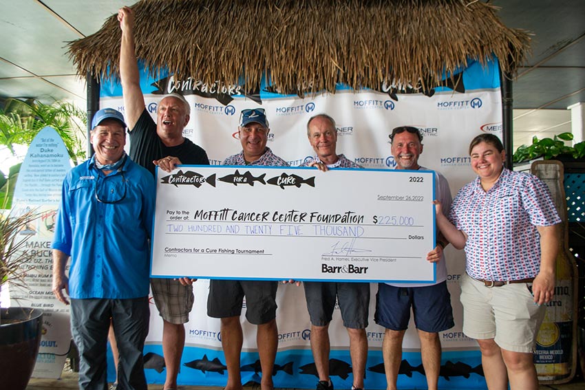 Check presentation at the Contractors for a Cure fishing tournament 