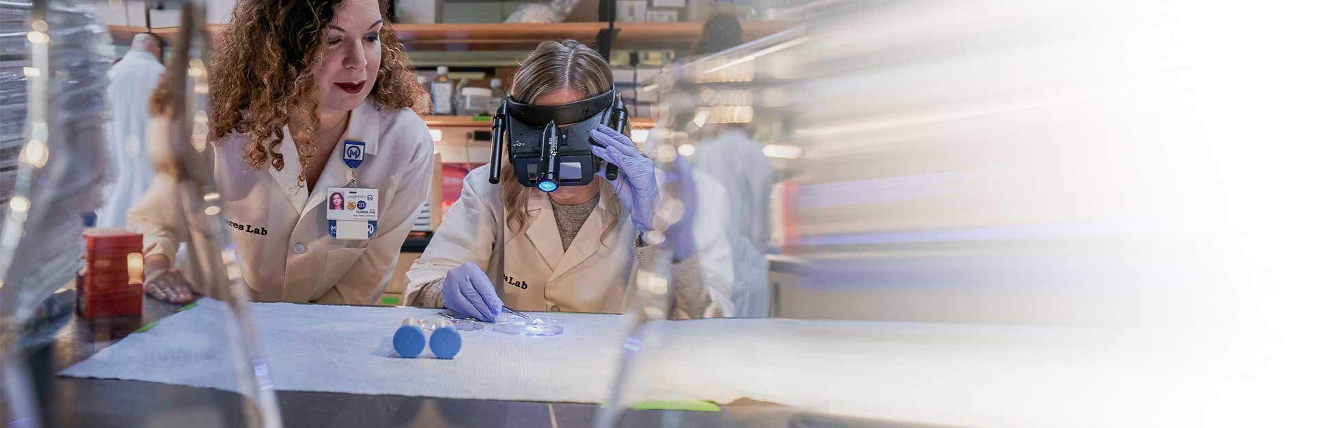 Two women researchers working in a lab