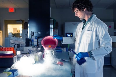 A researcher working in the Pilon-Thomas lab