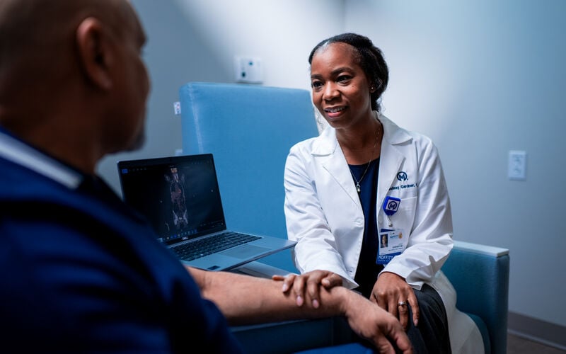 doctor speaking with patient